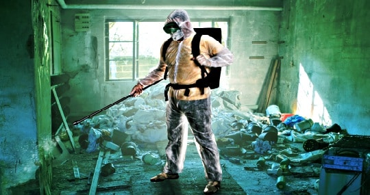 Man In Tyvek Suit Cleaning Up A Contaminated Room