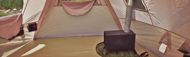 wall tent stove in canvas tent