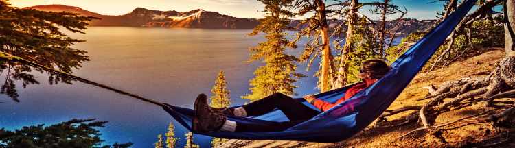 Hiker Relaxing in Hammock Crater Lake National Park Oregon