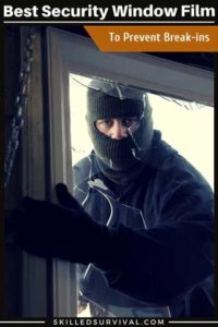 A Burglur Breaking Through A Window