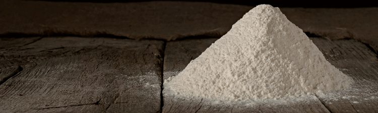 handful wheat flour closeup