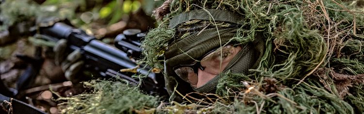 Hiding In Plain Sight In A Ghillie Suit